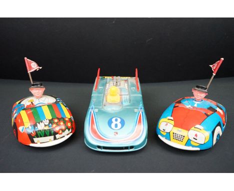 Three tinplate model vehicles, to include Daiya battery operated Porsche &amp; 2 x GDR made dodgem cars (3) 