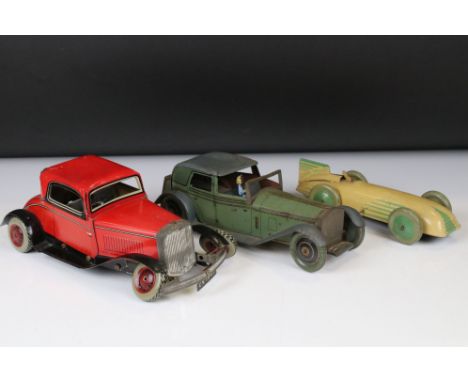 Chad Valley Harborne tin plate clockwork racing car in cream with green, with driver, plus a clockwork Chad Valley car in red