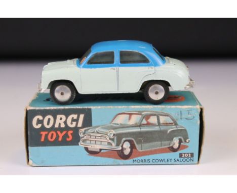 Boxed Corgi 202 Morris Cowley Saloon diecast model in two tone off white/blue colourway, blue outer box, some paint chips and