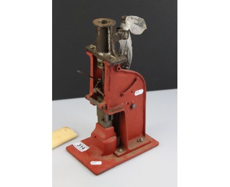Metal steam engine hammer in red, showing wear, 13" approx height 