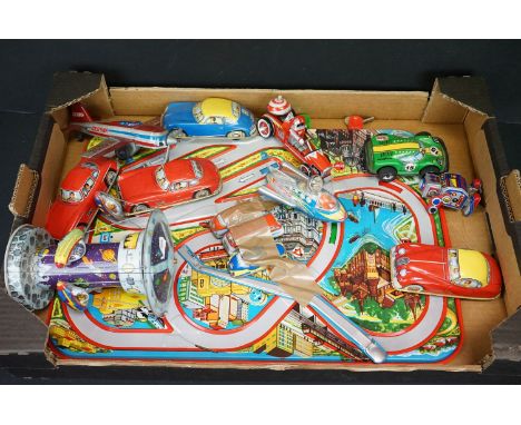 Collection of tinplate toys, to include roadway with vehicles, fairground spaceship ride, various cars, aeroplane, robot etc 