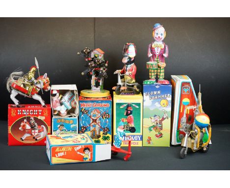 Group of seven boxed tinplate toys, to include Monkey On A Tricycle, Ice Cream Vender, Clown Drummer, Elephant On Bike, Clown