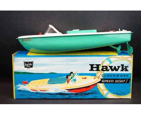 Boxed Sutcliffe Model Hawk clockwork metal speed boat in light green &amp; white, complete with flag &amp; key, excellent 