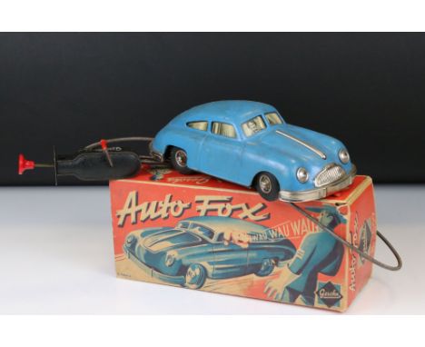 Boxed Gescha Auto Fox Nr 559 Porsche, mid blue body, plated trim, dog in window, control cable with remote, some grubby marks