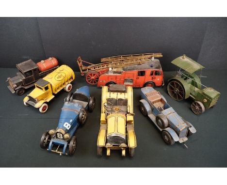 Seven assorted tinplate model vehicles, to include fire engine, steamroller, vintage racing cars, touring cars and commercial