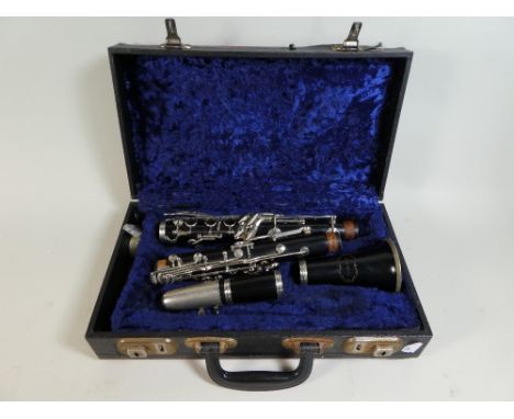 A Cased Clarinet by Warner  