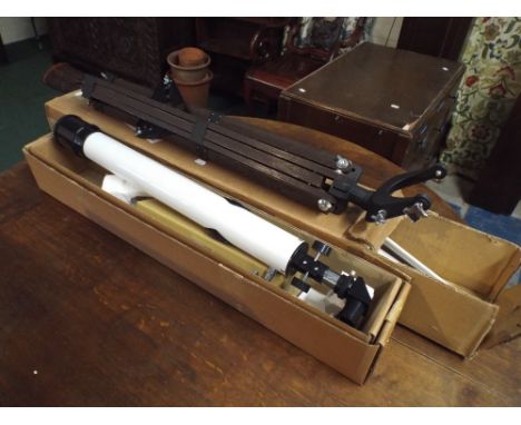 A 4" Reflector Telescope and Tripod Stand