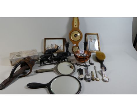 A Tray of Curios to Include Wrist Watches, Graduated Set of Elephants, Aneroid Barometer etc