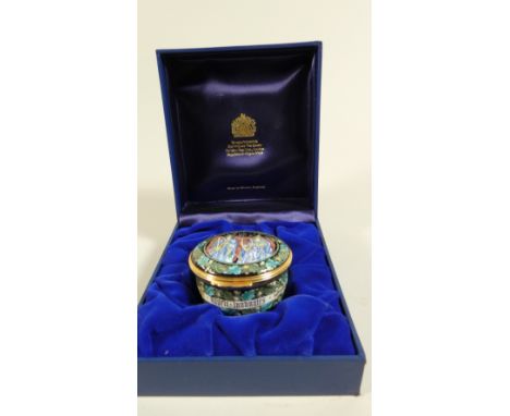 A Boxed Halcyon Days Enamel Circular Box Decorated with Angels 