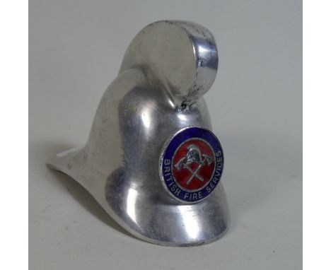 A Model Fireman's Helmet with Enamelled Badge Inscribed British Fire Service, 10cm Long