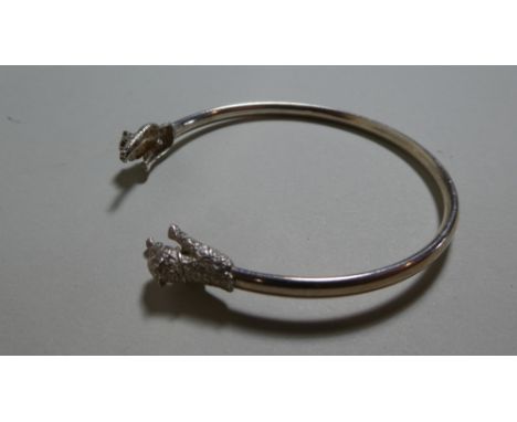 A Pretty White Metal Bangle with Two Big Cat Finals Having Red Glass Eyes
