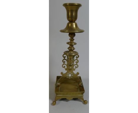 A Victorian Brass Candle Stick on Square Tray Base with Four Ball Feet, 26cm High