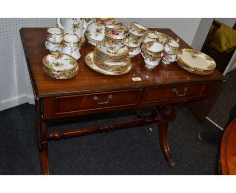 A reproduction mahogany sofa table , drop ends, lyre supports