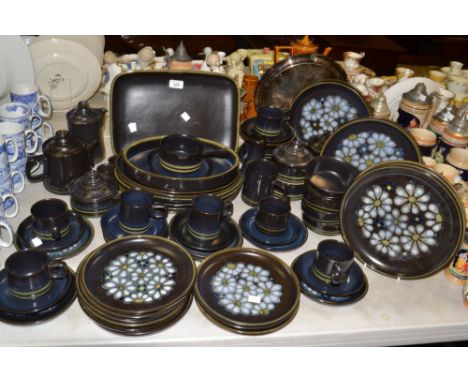 A Denby Bokhara pattern part dinner service comprising of dinner plates, cups, saucers, side plates, coffee pot, tea pot; etc