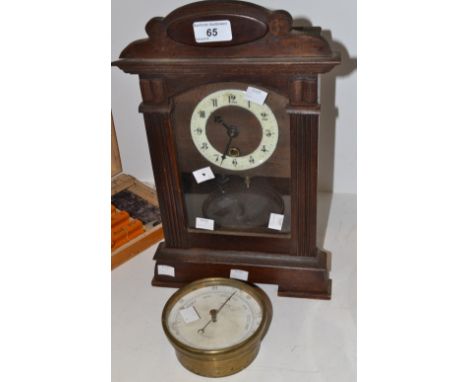An early 20th century mantel clock ; a J.Bryson, Optician, Edinburgh, brass barometer (2)