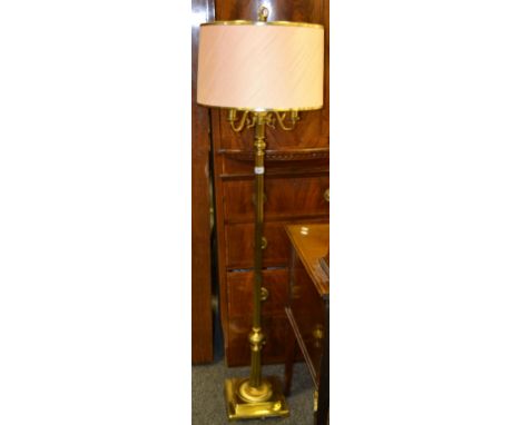 A contemporary gilt standard lamp