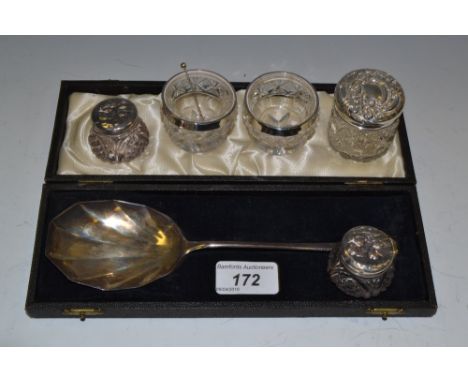 Silver- a silver serving spoon, Sheffield 1937; a pair of silver rimmed salts; Birmingham 1921; silver topped dressing table 