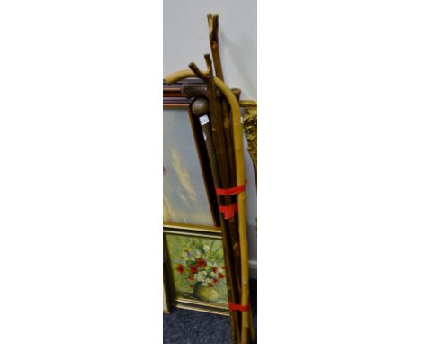 Walking sticks - a novelty stick with a brass greyhound handle, spirit flask concealed ;  others hawthorn, Horn etc (8)