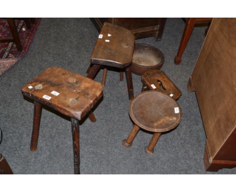 A 19th Century oak tripod stool; another similar; a carved mixing fruit bowl; etc (6)