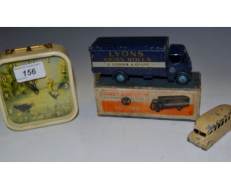 Toys- a Dinky Supertoys (514)Guy Van 'Lyons Swiss Rolls' .  blue livery, pale blue wheels, Boxed, some age   another Bus;  a 