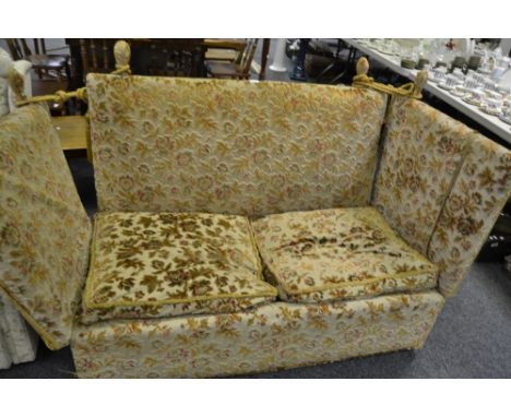 A 20th Century Knowle style drop arm sofa, upholstered in floral velvet