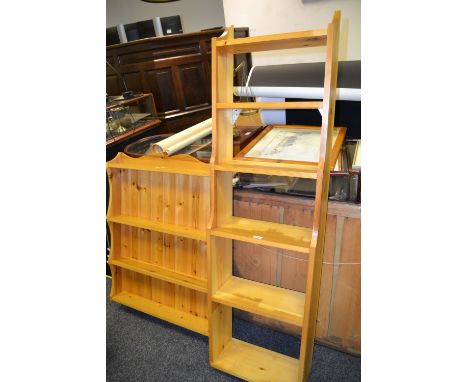 A 20th century pine wall hanging shelf unit; a set of five wall mounted shelves 