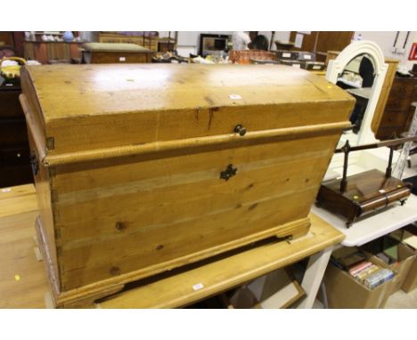 A large stripped pine dome top trunk