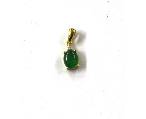 A Sterling silver and 14ct gold overlaid green jade and Cambodian Ziron pendant 