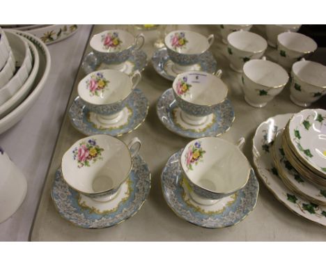 A set of six each Royal Albert "Enchantment" teacups and saucers