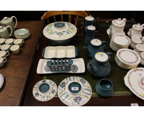 A quantity of Poole pottery tea and dinnerware 