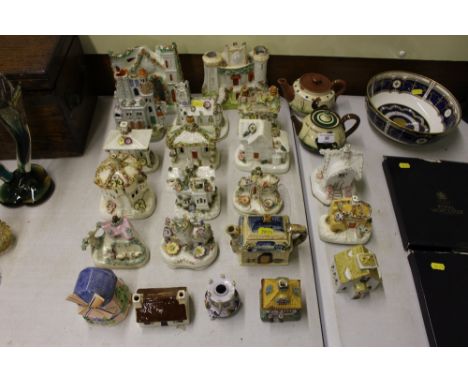 A large quantity of mostly 19th Century pastel burners; two Torquay pottery teapots etc. 