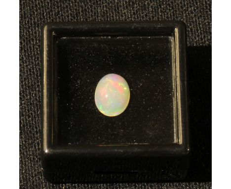 Loose gem Stones - an Australian opal, polished oval cabochon, 1.34cts 