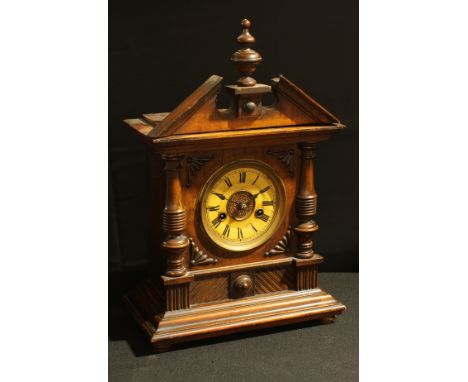A German Wurttemberg architectural fourteen day strike mantel clock, broken swan neck pediment with central finial, Roman num