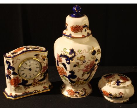A Mason's Mandalay pattern octagonal ginger jar and cover, 24cm; a similar mantel clock, 13cm; a trinket pot and cover, 11cm 
