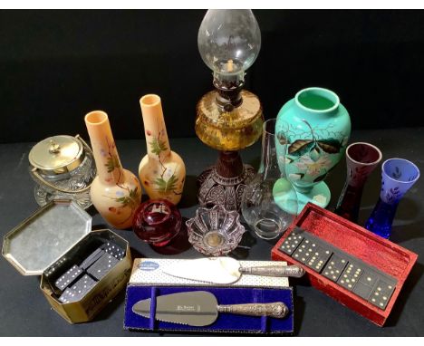 A Victorian amber glass and cast iron oil lamp;  opaque glass;  glass and plated biscuit barrel;  etc 