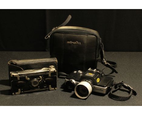 A Minolta 110 Zoom SLR camera, soft case and instructions, c.1976; an aluminium Ensignette number 1 with Rapid Rectilinear le