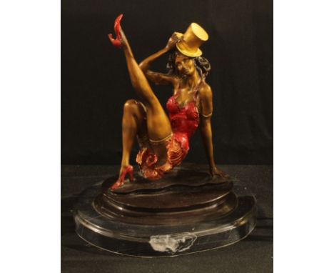 An Art Deco style bronze of a Burlesque dancer, Collett, oval marble base, 27cm high overall 