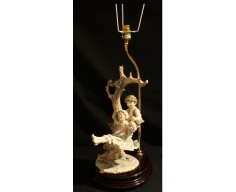 An Italian Giuseppe Armani Florence figural table lamp, as children on a swing, 39cm 