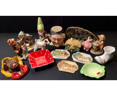 A Goebel figure, after MJ Hummel, Washing Dolly;  others, Gnome with Frying pan, Boy on a Fence;  a character jug, Toothless 