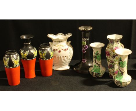 A Shelley garniture of three vases, butterfly pattern, number 680712, 8431, the tallest 17cm, printed and painted marks; othe