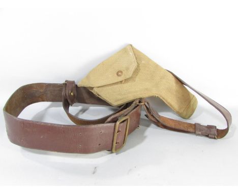 A British Army issue brown leather Sam Brown belt and shoulder strap together with a khaki canvas pistol holster. 