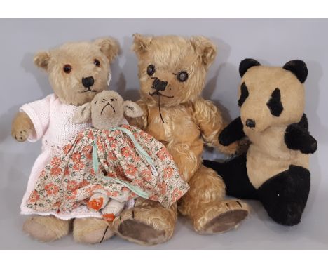 Two vintage teddy bears in golden plush with stitched mouth, nose and claws, heights 42 and 40cm, together with a soft toy Pa