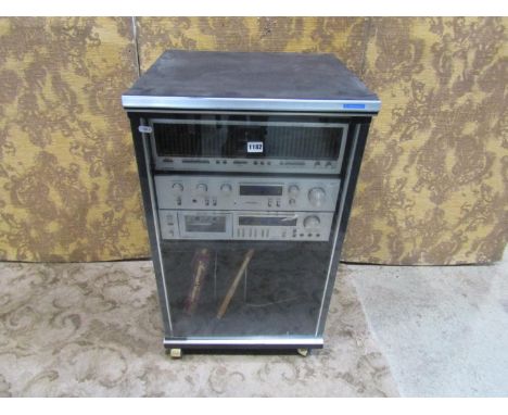 A Pioneer Hi-Fi  system housed within a cabinet comprising a graphic equalizer model SG-90 stereo amplifier model number SA-6