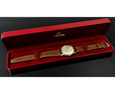 Omega. A gentleman’s vintage 9ct yellow gold cased wrist watch, with baton spacers, 30mm case, 17 jewel movement, on later le