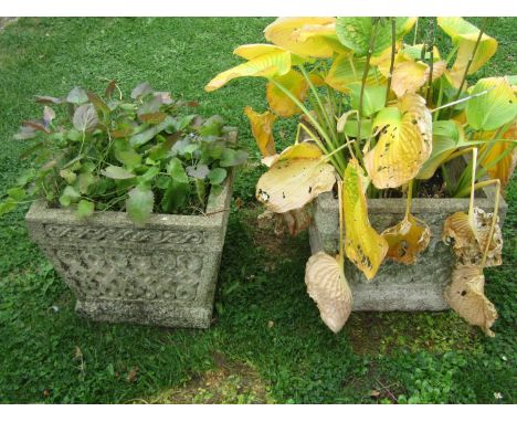 A pair of weathered composition stone planters of tapering squared form with Celtic knot moulded detail, 34cm high, 40 x 40cm