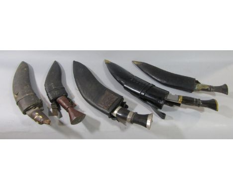 Five Kukri in leather and other scabbards 