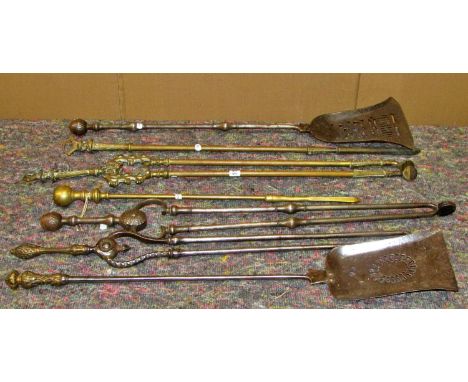 A collection of Regency fireside tools 