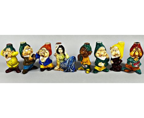 A Snow White and The Seven Dwarves Italian ceramic collection in the form of flasks 