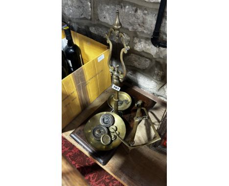 A set of Bartlett of Bristol brass grocer’s scales with a selection of weights.