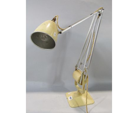 A vintage canter-lever cream painted metal office lamp. 